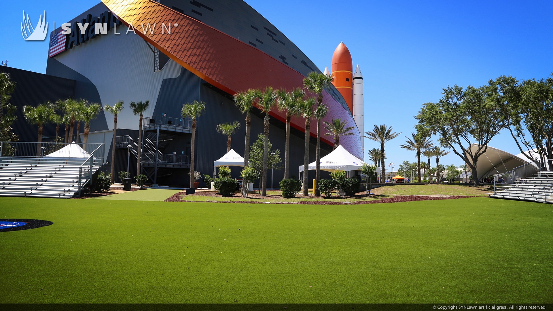 commercial lawn in front of museum with artificial grass