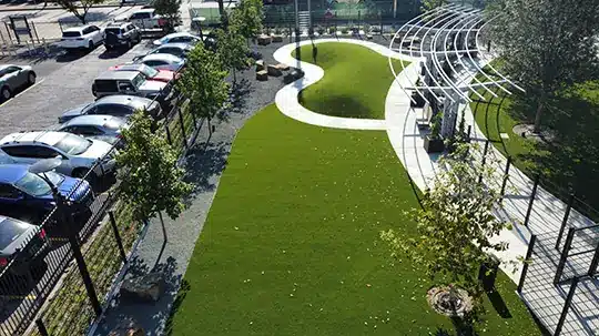 Drone shot of an artificial grass dog park