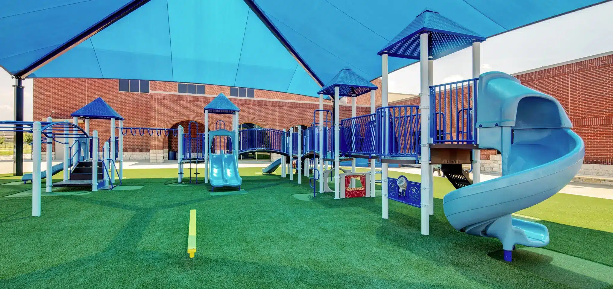 Artificial grass playground installed by SYNLawn